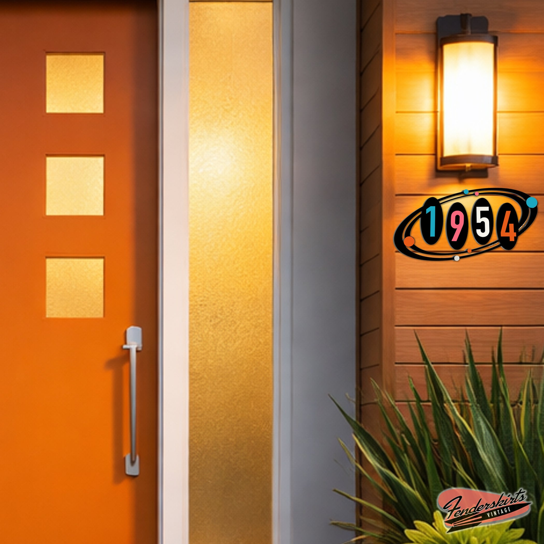 Orange door with a light fixture and decorative sign on a wooden wall.